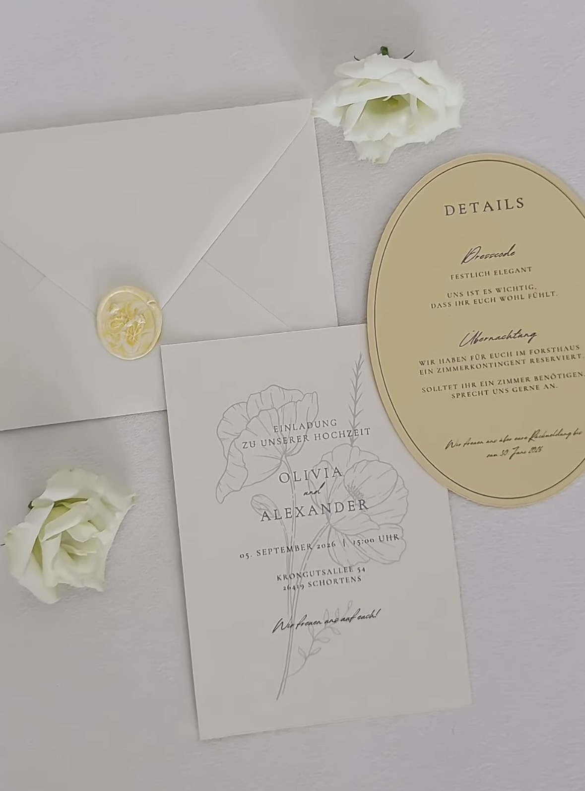 Ivory invitation suite with oval details card